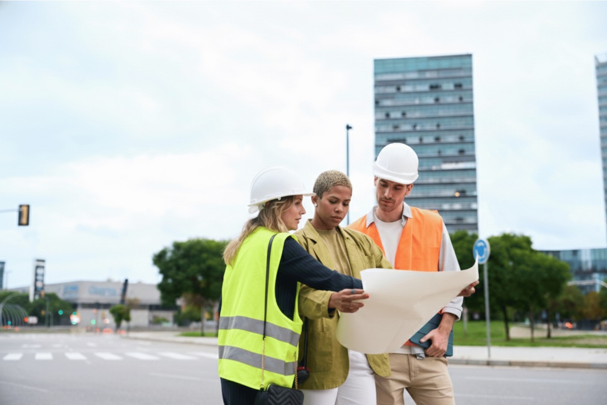 Moon-Matz engineers reviewing blueprints on site